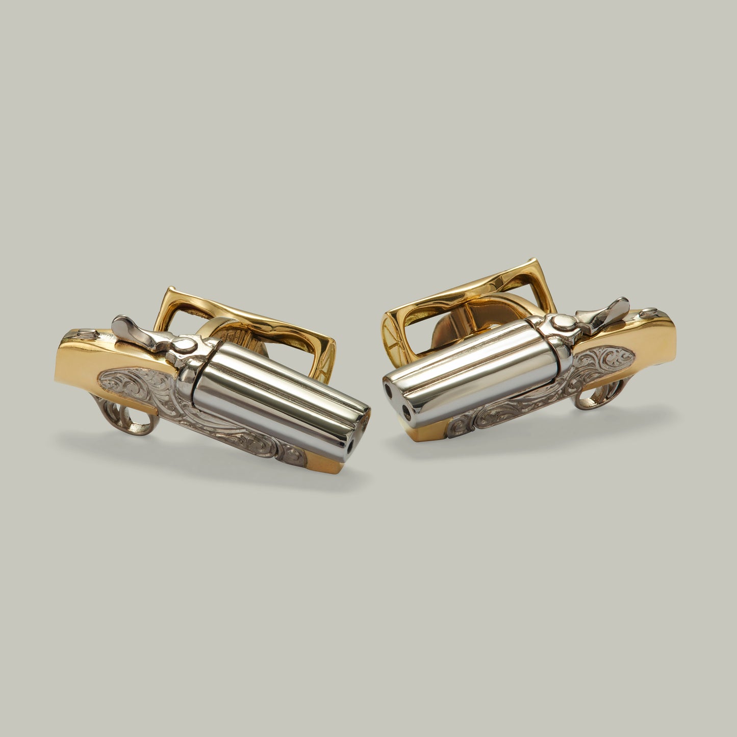 18Ct gold Opening & Closing Pair Of H&H Shotguns