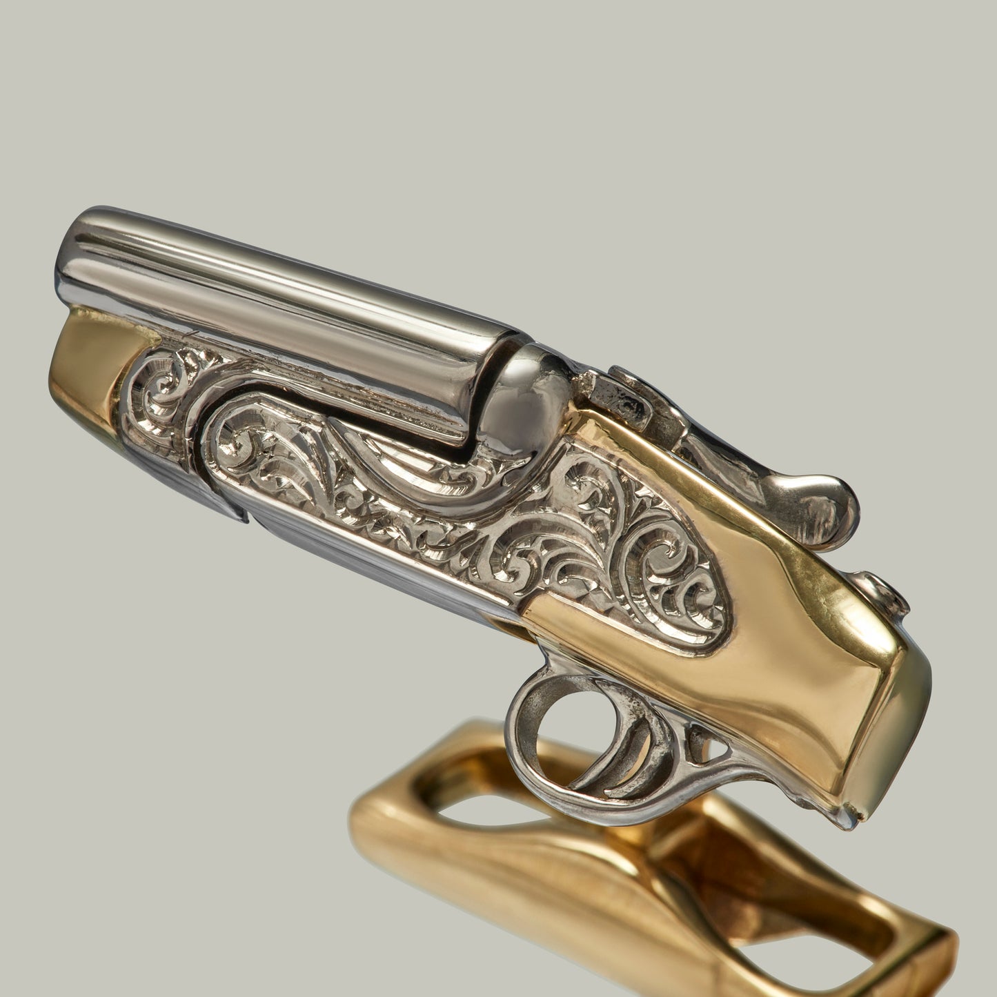 18Ct gold Opening & Closing Pair Of H&H Shotguns