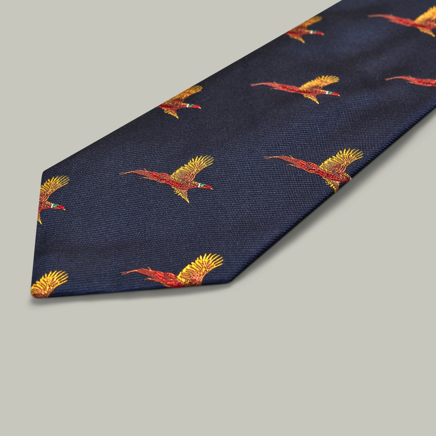 Harrow Silk Woven Tie - Flying Pheasant [INDIGO]